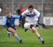 16 December 2007; Hugh Gill, St Vincent's, in action against Denis Glennon, Tyrrelspass. AIB Leinster Club Football Championship Final, Tyrrelspass, Co. Westmeath v St Vincent's, Co. Dublin,  Cusack Park, Mullingar, Co. Westmeath. Picture credit; Brian Lawless / SPORTSFILE