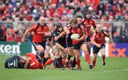 16 December 2007; Jerry Flannery, Munster, is tackled by Vernon Cooper and Simon Easterby, Llanelli Scarlets. Heineken Cup, Pool 5, Round 4, Munster v Llanelli Scarlets, Thomond Park, Limerick. Picture credit: Matt Browne / SPORTSFILE *** Local Caption ***