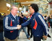 28 December 2007; Munster's new signing and New Zealand international Doug Howlett is greeted by Munster director of rugby Declan Kidney on his arrival at Cork Airport before starting the next stage of his rugby career with Munster. Cork Airport, Cork. Picture credit; Brendan Moran / SPORTSFILE *** Local Caption ***