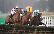 29 December 2007; Indian Pace, with Kevin Coleman up, left, clears the last ahead of second place Silver Jaro, David Casey up, and third place Gemini Lucy, Andrew Leigh up, on the way to winning The Bewleys Hotel Leeds Hurdle of Ä20,000. Leopardstown Racecourse, Leopardstown, Dublin. Picture credit; Brian Lawless / SPORTSFILE