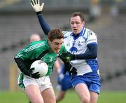 30 December 2007; Charlie Vernon, Queens, in action against Vincent Corey, Monaghan. Gaelic Life Dr McKenna Cup, Section C, Monaghan v Queens, St Tiearnach's Park, Clones, Co. Monaghan. Picture credit; Oliver McVeigh / SPORTSFILE