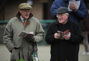 31 December 2007; Race fans check the form before the Visit The Panoramic Restaurant Beginners Steeplechase. Punchestown Races, Punchestown Racecourse, Co. Kildare. Picture credit; Pat Murphy / SPORTSFILE