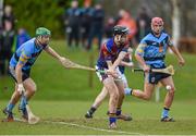 18 February 2015; John McGrath, UL, shoots to score a point despite pressure from Cian O'Callaghan, left, and Cillian Buckley, UCD. Independent.ie Fitzgibbon Cup Quarter-Final, UL v UCD. University of Limerick, Limerick. Picture credit: Diarmuid Greene / SPORTSFILE