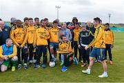 19 February 2015; LA Galaxy striker Robbie Keane turned a training session into a field of dreams for Special Olympics Ireland footballers yesterday. The Irish football captain, who is in town to face Shamrock Rovers this weekend, invited the athletes to a skills session where they got to meet several of the LA Galaxy players. This is the second time Keane has trained with the athletes. The soccer legend and his wife Claudine are supporting the 88 Irish athletes heading to the 2015 Special Olympics World Games in Los Angeles. He is urging the country to get behind them and help raise the €440,000 target to fund the trip. Full details of Special Olympics Ireland Support An Athlete campaign can be found at www.specialolympics.ie. Pictured is LA Galaxy star Robbie Keane arrived for a group photograph. Picture credit: Ramsey Cardy / SPORTSFILE