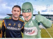 20 February 2015; Robbie Keane, LA Galaxy, with Shamrock Rovers mascot Hooperman, after squad training. Tallaght Stadium, Tallaght, Co. Dublin. Picture credit: David Maher / SPORTSFILE