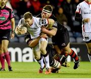 20 February 2015; Darren Cave, Ulster, is tackled by WP Nel, Edinburgh. Guinness PRO12, Round 15, Edinburgh v Ulster. Murrayfield Stadium, Edinburgh, Scotland. Picture credit: Craig Williamson / SPORTSFILE