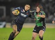 4 January 2008; Regan King, Llanelli Scarlets, is tackled by Mel Deane, Connacht. Magners League, Connacht Rugby v Llanelli Scarlets, Sportsground, Galway. Picture credit: Matt Browne / SPORTSFILE