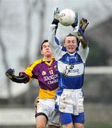 6 January 2008; Peter O'Leary, Laois, in action against Shane Roche, Wexford. O'Byrne Cup, First Round, Wexford v Laois, Belfield, Enniscorthy, Co. Wexford. Picture credit; Matt Browne / SPORTSFILE