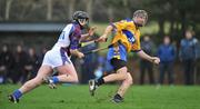 6 January 2008; Tony Griffin, Clare, in action against Peter O'Brien, UL. Waterford Crystal Cup, Clare v University of Limerick, Meelick, Co. Clare. Picture credit; Brendan Moran / SPORTSFILE *** Local Caption ***