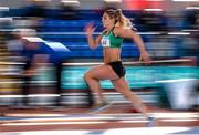 21 February 2015; Kelly Proper, Ferrybank AC, on her way to winning the Women's Long Jump event during Day 1 of the GloHealth Senior Indoor Championships. Athlone International Arena, Athlone, Co.Westmeath. Picture credit: Pat Murphy / SPORTSFILE