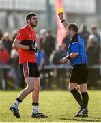 21 February 2015; Luke Connolly, UCC, is shown a yellow card by referee Eddie Kinsella. Independent.ie Sigerson Cup Final, UCC v DCU. The Mardyke, Cork. Picture credit: Diarmuid Greene / SPORTSFILE