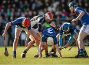 21 February 2015; Cathal Moloney of Thurles CBS supported by team-mates Dillon Quirke, left, and Enda Heffernan, centre, try to win possession from Ciaran Cormack of St Francis College during the Dr Harty Cup Final match between Thurles CBS, Tipperary, and St Francis College, Cork, at the Mallow GAA Complex in Cork. Photo by Piaras Ó Mídheach/Sportsfile