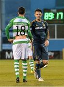 21 February 2015; Robbie Keane, LA Galaxy, shakes hands with Keith Fahey, Shamrock Rovers, as he is substituted during the closing stages of the game. Pre-Season Friendly, Shamrock Rovers v LA Galaxy, Tallaght Stadium, Tallaght, Co. Dublin. Picture credit: David Maher / SPORTSFILE