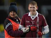 15 February 2015; Christopher Bradley, Slaughtneil, has his arm held after the game. He left the pitch with a suspected broken collarbone in the final moments of the game. AIB GAA Football All-Ireland Senior Club Championship, Semi-Final, Austin Stacks v Slaughtneil, O'Moore Park, Portlaoise, Co. Laois. Picture credit: Brendan Moran / SPORTSFILE