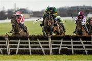 22 February 2015; A Hardy Nailer, with Mark Walsh up, leads eventual winner Arctic Skipper, with Andrew Lynch up, over the last fence in the Paddy Power Shops 10.30am Sunday Service Maiden Hurdle. Naas Racecourse, Naas, Co. Kildare. Picture credit: Ramsey Cardy / SPORTSFILE