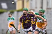 22 February 2015; Matthew O'Hanlon, Wexford, in action against Joe Bergin, Offaly. Allianz Hurling League, Division 1B, Round 2, Offaly v Wexford, O'Connor Park, Tullamore, Co. Offaly. Picture credit: David Maher / SPORTSFILE