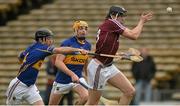 22 February 2015; Joseph Cooney, Galway,  in action against Conor O' Brien and Ronan Maher, Tipperary. Allianz Hurling League, Division 1A, Round 2, Tipperary v Galway, Semple Stadium, Thurles, Co. Tipperary. Picture credit: Ray Ryan / SPORTSFILE