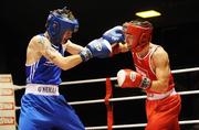 10 January 2008; Shane Cox, Gorey Boxing Club, blue, in action against Jamie Conlon, St. John Bosco's Boxing Club, red. National Senior Boxing Championships Semi-Finals, 51Kg Flyweight Championship, Conor Ahern.v.Ruairi Dalton, National Boxing Stadium, South Circular Road, Dublin. Picture credit; Stephen McCarthy / SPORTSFILE