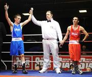 10 January 2008; Shane Cox, Gorey Boxing Club, blue, is announced victorious over Jamie Conlon, St. John Bosco's Boxing Club. National Senior Boxing Championships Semi-Finals, 51Kg Flyweight Championship, Jamie Conlon.v.Shane Cox, National Boxing Stadium, South Circular Road, Dublin. Picture credit; Stephen McCarthy / SPORTSFILE