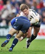 12 January 2008; Cedric Heymans, Toulouse, is tackled by Felipe Contepomi, Leinster. Heineken Cup, Pool 6, Round 5, Leinster v Toulouse, RDS, Dublin. Picture credit; Brendan Moran / SPORTSFILE