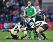12 January 2008; Brian O'Driscoll, Leinster, is tackled by Jean Bouilhou, left, and Virgile Lacombe, Toulouse. Heineken Cup, Pool 6, Round 5, Leinster v Toulouse, RDS, Dublin. Picture credit; Brendan Moran / SPORTSFILE *** Local Caption ***