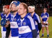21 February 2015; Charles Dwyer and his Laois team-mates during the national anthem. Allianz Hurling League Division 1B, Round 2, Waterford v Laois. Fraher Field, Dungarvan, Co. Waterford. Picture credit: Stephen McCarthy / SPORTSFILE