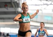 22 February 2015; Kelly Proper, Ferrybank AC, crosses the finish line to win the Women's 200m event during Day 2 of the GloHealth Senior Indoor Championships. Athlone International Arena, Athlone, Co. Westmeath. Picture credit: Pat Murphy / SPORTSFILE