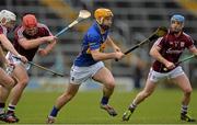 22 February 2015; Denis Maher, Tipperary, in action against Galway's, from left, Padraig Brehony, Iarla Tannian and Andrew Smith. Allianz Hurling League, Division 1A, Round 2, Tipperary v Galway. Semple Stadium, Thurles, Co. Tipperary. Picture credit: Piaras Ó Mídheach / SPORTSFILE