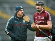 22 February 2015; Galway manager Anthony Cunningham commiserates with his midfielder Joseph Coone after their defeat. Allianz Hurling League, Division 1A, Round 2, Tipperary v Galway, Semple Stadium, Thurles, Co. Tipperary. Picture credit: Ray Ryan / SPORTSFILE