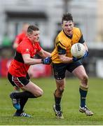 21 February 2015; Mickey Quinn, DCU, in action against Conor Cox, UCC. Independent.ie Sigerson Cup Final, UCC v DCU. The Mardyke, Cork. Picture credit: Diarmuid Greene / SPORTSFILE