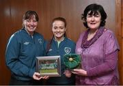 23 February 2015; Naoisha McAloon, Republic of Ireland, receives her international cap from team manager Sharon Boyle and Frances Smith, WFAI. Republic of Ireland Under 16 Squad Caps Presentation, Board Room, Gannon Park, Malahide, Co. Dublin. Picture credit: David Maher / SPORTSFILE