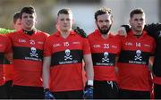 21 February 2015; UCC players, from left to right, Kevin Fulignati, Conor Cox, Colm Hyde and Paul Geaney during the playing of the national anthem. Independent.ie Sigerson Cup Final, UCC v DCU. The Mardyke, Cork. Picture credit: Diarmuid Greene / SPORTSFILE