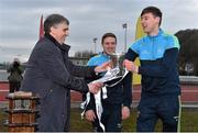 21 February 2015; DCU's Davey Byrne, and Tom Flynn, right, are presented with the Sigerson Cup by Gerry Tully, Chairman Comhairle Ardoideachais, after defeating UCC. Independent.ie Sigerson Cup Final, UCC v DCU. The Mardyke, Cork. Picture credit: Diarmuid Greene / SPORTSFILE