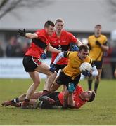 21 February 2015; Donal Smith, DCU, in action against Jack McGuire, left, Sean White and Paul Geaney, right, UCC. Independent.ie Sigerson Cup Final, UCC v DCU. The Mardyke, Cork. Picture credit: Diarmuid Greene / SPORTSFILE