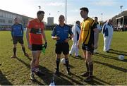 21 February 2015; Referee Eddie Kinsella performs the pre-match coin toss in the company of UCC captain Thomas Clancy and DCU captain Colm Begley. Independent.ie Sigerson Cup Final, UCC v DCU. The Mardyke, Cork. Picture credit: Diarmuid Greene / SPORTSFILE