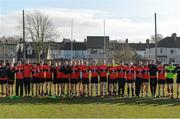 21 February 2015; The UCC squad stand together during the playing of the national anthem. Independent.ie Sigerson Cup Final, UCC v DCU. The Mardyke, Cork. Picture credit: Diarmuid Greene / SPORTSFILE