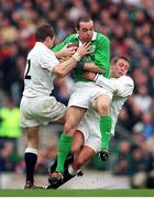 5 February 2000; Conor O'Shea, Ireland, is tackled by Mike Catt, 12, and Jonny Wilkinson, England. Six Nations Rugby International, England v Ireland, Twickenham, London, England. Picture credit: Matt Browne / SPORTSFILE