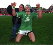 20 October 2001; Ireland's Trevor Brennan celebrates with a fan after victory over England. Ireland v England, Six Nations Championship, Lansdowne Road, Dublin. Picture credit: Matt Browne / SPORTSFILE
