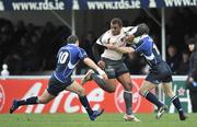 12 January 2008; Maleli Kunavore, Toulouse, is tackled by Felipe Contepomi, left, and Gordon Darcy, Leinster. Heineken Cup, Pool 6, Round 5, Leinster v Toulouse, RDS, Dublin. Picture credit; Brendan Moran / SPORTSFILE *** Local Caption ***