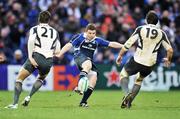 12 January 2008; Brian O'Driscoll, Leinster, kicks downfield against Gaffie Du Toit, left, and Jean Bouilhou, Toulouse. Heineken Cup, Pool 6, Round 5, Leinster v Toulouse, RDS, Dublin. Picture credit; Brendan Moran / SPORTSFILE