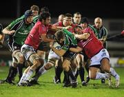 18 January 2008; Matt Mostyn, Connacht Rugby, is tackled by Simon Azoulai, left, and Jean-Phillippe Bonrepaux, Brive. European Challenge Cup, Pool 3, Round 6, Connacht Rugby v Brive, Sportsground, Galway. Picture credit; Matt Browne / SPORTSFILE