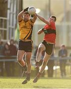 21 February 2015; Donal Wrynn, DCU, in action against Jack McGuire, UCC. Independent.ie Sigerson Cup Final, UCC v DCU. The Mardyke, Cork. Picture credit: Diarmuid Greene / SPORTSFILE