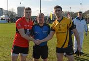 21 February 2015; UCC captain Thomas Clancy and DCU captain Colm Begley exchange a handshake in the company of referee Eddie Kinsella before the game. Independent.ie Sigerson Cup Final, UCC v DCU. The Mardyke, Cork. Picture credit: Diarmuid Greene / SPORTSFILE