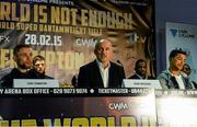 26 February 2015;  Barry McGuigan, Chief Executive of Cyclone promotions, centre, with boxers Carl Frampton, left, and Chris Avalos, during a press conference ahead of their IBF World Super Bantamweight title fight on Saturday night. Europa Hotel, Belfast, Co. Antrim. Picture credit: Oliver McVeigh / SPORTSFILE