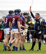 27 February 2015; Jack Browne, UL, is shown a straight red card by referee James McGrath. Independent.ie Fitzgibbon Cup Semi-Final, University of Limerick v Limerick IT. Limerick IT, Limerick. Picture credit: Diarmuid Greene / SPORTSFILE