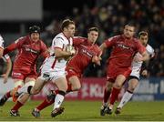 27 February 2015; Darren Cave, Ulster, bursts throught the Scarlets defence. Guinness PRO12 Round 16, Ulster v Scarlets. Kingspan Stadium, Ravenhill Park, Belfast. Picture credit: Oliver McVeigh / SPORTSFILE