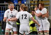 27 February 2015; England captain Charlie Ewels, left, celebrates with his team-mates at the final whistle. U20's Six Nations Rugby Championship, Ireland v England. Donnybrook Stadium, Donnybrook, Dublin. Picture credit: Brendan Moran / SPORTSFILE