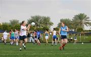 25 January 2008; Cathy Donnelly, Tyrone, left, takes a pass from Rena Buckley, Cork, during squad training. O'Neills/TG4 Ladies Gaelic Football All Star Tour 2007, Dubai Polo and Equestrian Club, Dubai, United Arab Emirates. Picture credit: Brendan Moran / SPORTSFILE  *** Local Caption ***