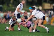 26 January 2008; Tracey Lawlor, Laois and 2007 Ladies All Stars, in action against Maura Kelly, right, Tyrone, and Aoibheann Daly, left, Galway and 2006 Ladies All Stars. Exhibition Game, 2006 O'Neills/TG4 Ladies GAA All Stars v 2007 O'Neills/TG4 Ladies GAA All Stars, Dubai Polo and Equestrian Club, Dubai, United Arab Emirates. Picture credit: Brendan Moran / SPORTSFILE  *** Local Caption ***
