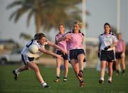 26 January 2008; Juliet Murphy, Cork and 2007 All Stars, in action against Alma O'Donnell, Armagh and 2006 All Stars. Exhibition Game, 2006 O'Neills/TG4 Ladies GAA All Stars v 2007 O'Neills/TG4 Ladies GAA All Stars, Dubai Polo and Equestrian Club, Dubai, United Arab Emirates. Picture credit: Brendan Moran / SPORTSFILE  *** Local Caption ***